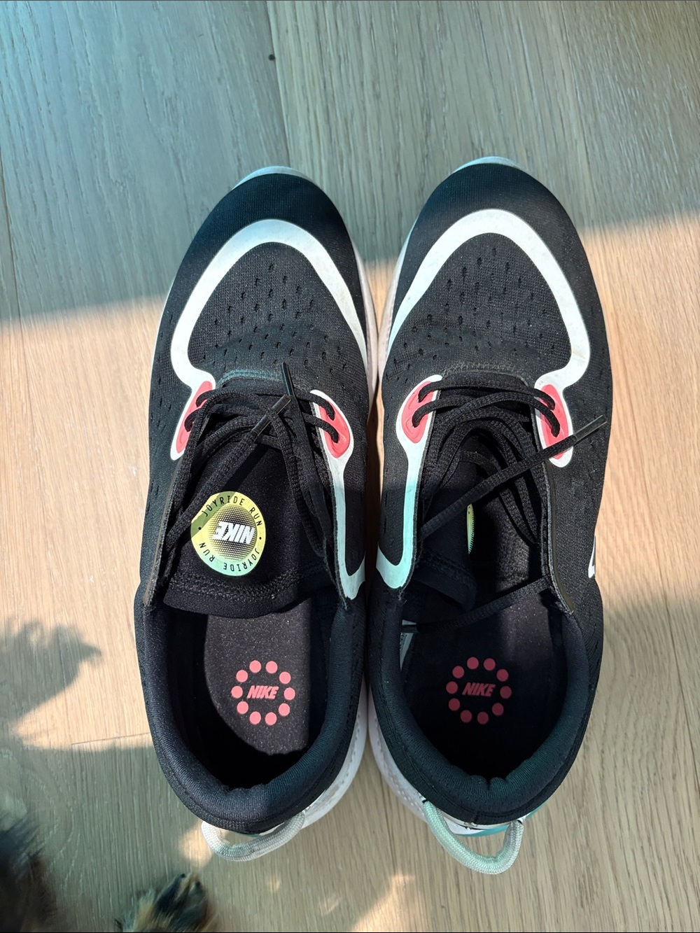 Nike JoyRide Run Black, White and Coral Athletic Sneakers